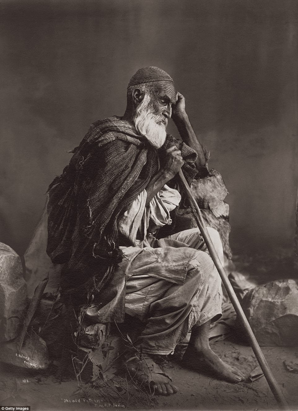 This elderly Pathan, or Pashtun man was photographed in what is now Pakistan in British India in 1915, seen here on silver gelatin print. The Pashtun tribe is known for its emphasis on the nobility of endeavours both militaristic and poetic