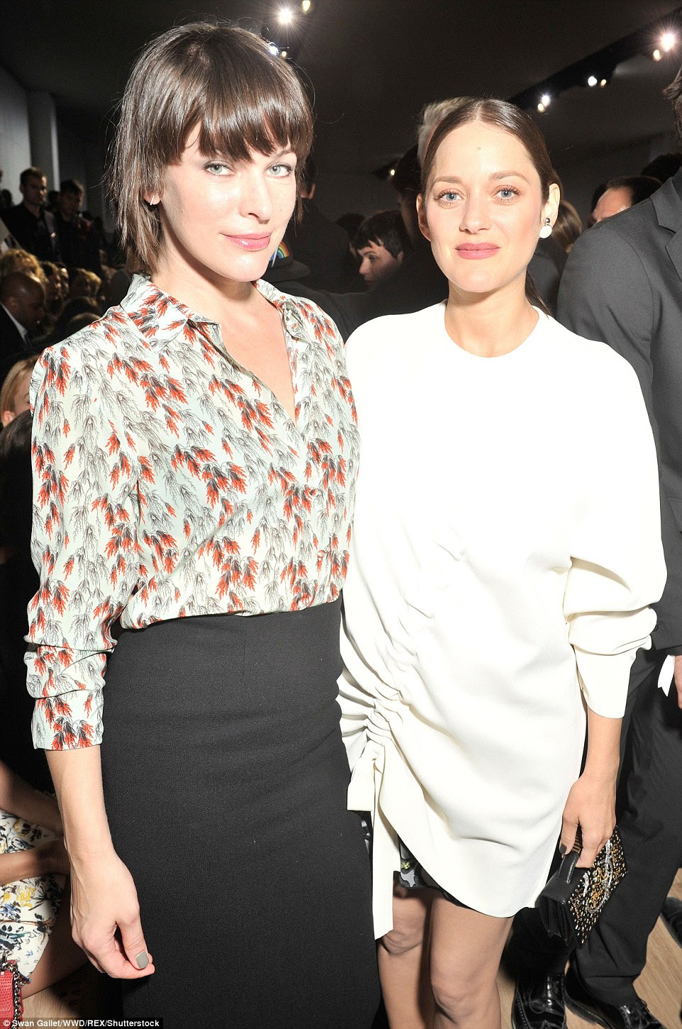 Stars united: She posed for a shot with fellow actress Milla Jovovich at the hot ticket event