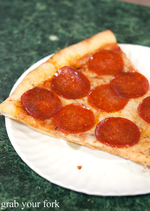 pepperoni pizza slice at rosario pizza lower east side italian new york pizza ny usa