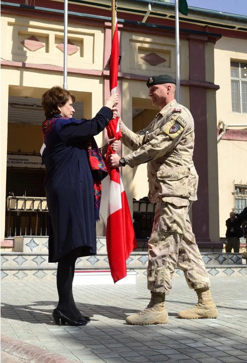 Last Canadian commander hands flag to ambassador at leaving ceremony in Kabul