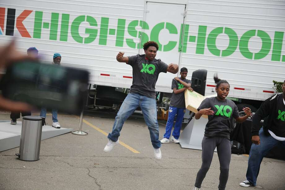 Future Shock members, a youth dance group with Culture Shock Oakland,  Jalen Hodge, 14, Envision High School; Chevelle Robinson, 16, Mission High School and Romeikus Moore, 16, City Arts & Technology High School, perform at the XQ roadshow on Wednesday, December 9,  2015 in Oakland, Calif. Photo: Lea Suzuki, The Chronicle