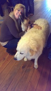 Tiffany with two of the dogs from Cavender Creek Winery