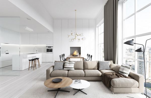 With an open floor plan, the slightest color shift can mean everything. Here, a beige sofa distinguishes the living area from its stark, white surroundings.