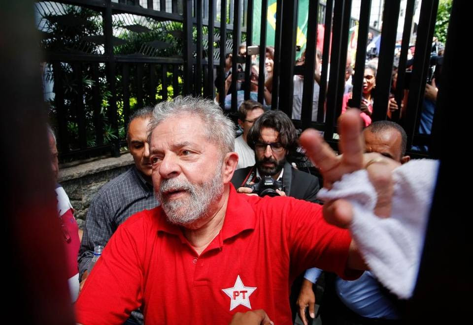Former Brazilian President Luiz Inacio Lula da Silva greeted supporters after he was held for questioning by police.