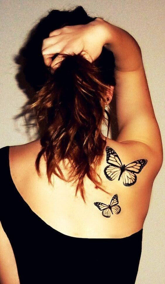 White Butterfly Tattoo On Black Skin Tattoo Design