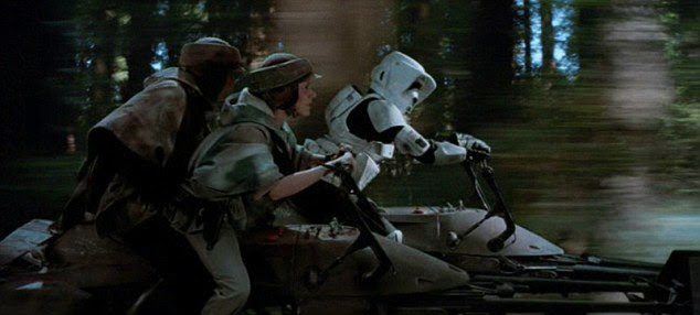 Big screen: Luke Skywalker(Mark Hamill) and Princess Leia (Carrie Fisher) battle a baddie on their speeder bike in Star Wars Return of the Jedi