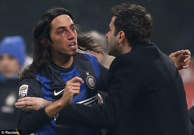 Tears: Schelotto cries as he celebrates with coach Andrea Stramaccioni