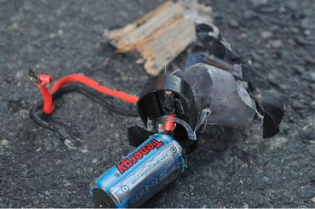 Boston Marathon bomb scene pictures taken by investigators show the remains of an explosive device. The photos were produced by the Joint Terrorism Task Force of Boston, provided to Reuters April 16, 2013 by a U.S. government official who declined to be identified. REUTERS