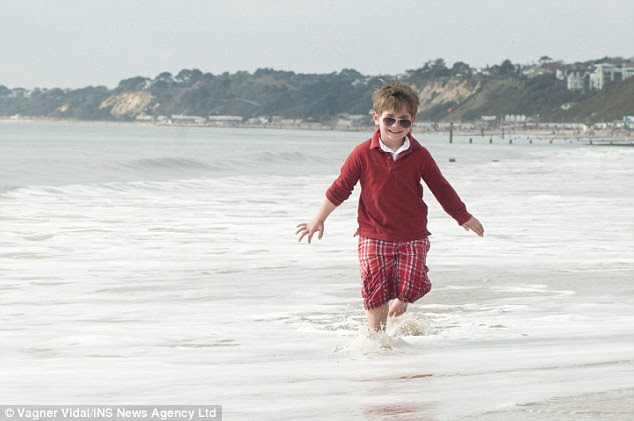 Five-year-old Leonardo Lima Hyra was enjoying the sunshine so much he braved the water on Bournemouth beach, Dorset