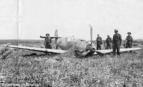 The enemy: British soldiers guard a Luftwaffe fighter plane that went down during the Battle of Britain in 1940