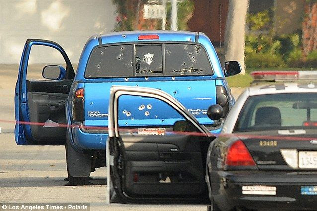 photo copshotnewspaperdelivery.jpg