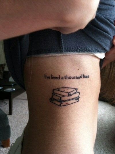"I've lived a thousand lives" books tattoo. I love the idea :)