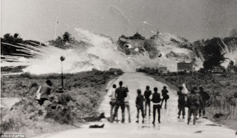 Huynh Cong 'Nick' Ut took this picture just moments before capturing his iconic image. It shows bombs with a mixture of napalm and white phosphorus jelly and reveals that he moved closer to the village following the blasts