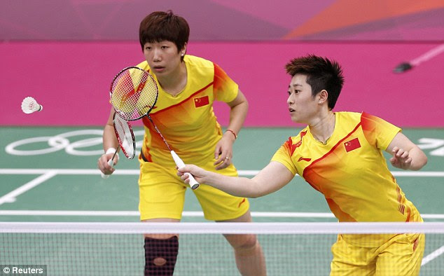 Farce: China's Wang Xiaoli and Yu Yang play against South Korea's Jung Kyung-eun and Kim Ha-na 