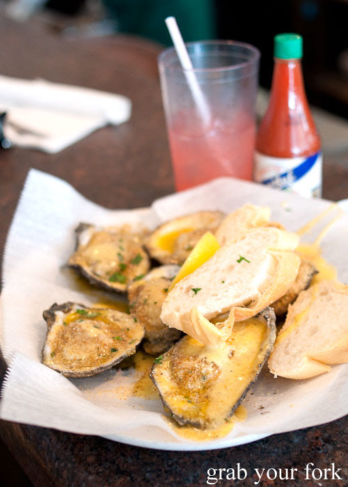 char-grilled oysters at felix's restaurant and oyster bar new orleans louisiana