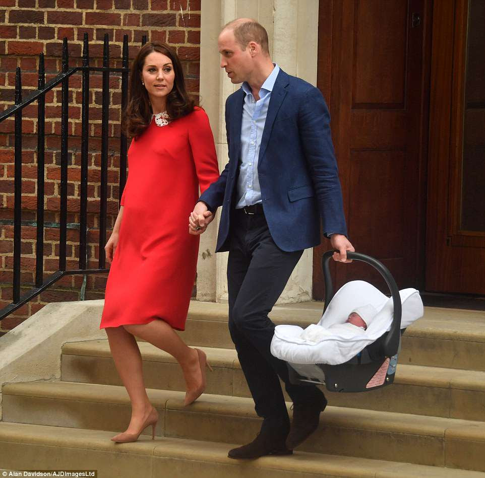 The pair held hands as they prepared to drive the baby home from the hospital