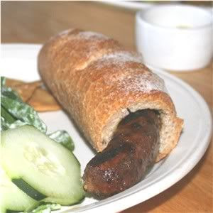 Nancy's long sweet sausage in a bun. Nancy's long sweet sausage in a bun.
