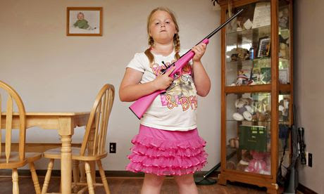 Abby, aged 8, from Louisiana, photographed by  
An-Sofie Kesteleyn for her series My Little Rifle
