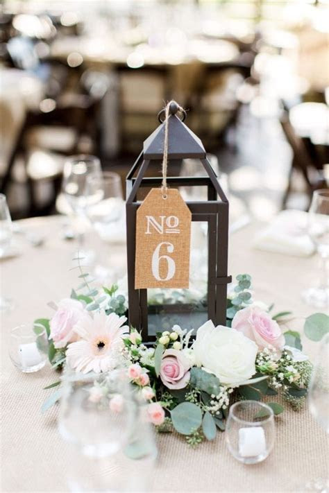 51 Unique Table Number Ideas for Wedding Receptions (and DIYs) 51 Unique Table Number Ideas for Wedding Receptions (and DIYs)
