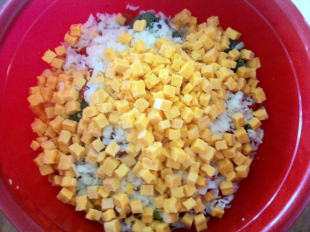 Cubed Cheddar Cheese Added to Salad