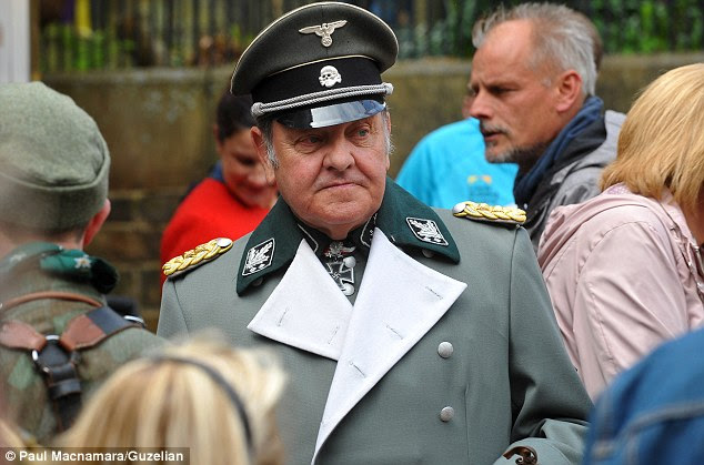 One man wore a replica Nazi uniform to that of German General Sepp Dietrich, who was in charge of the Panzer division