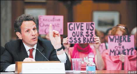US Treasury Secretary and Wall Street advocate Tim Geithner testified April 20, 2009 before Congress. Members of a women's group Code Pink protested his rhetoric in favor of bank bailouts with no relief for the millions of poor and working people. by Pan-African News Wire File Photos