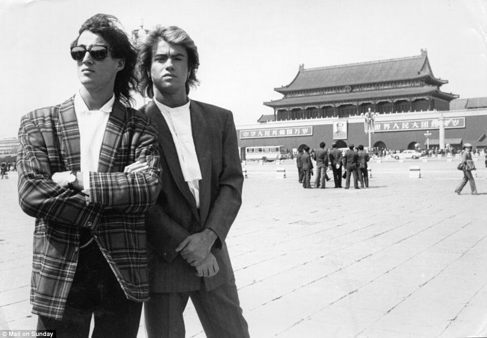 Pictured: George Michael and Andrew Ridgley from the pop group Wham! posed for a photograph during a visit to China in the 1980s