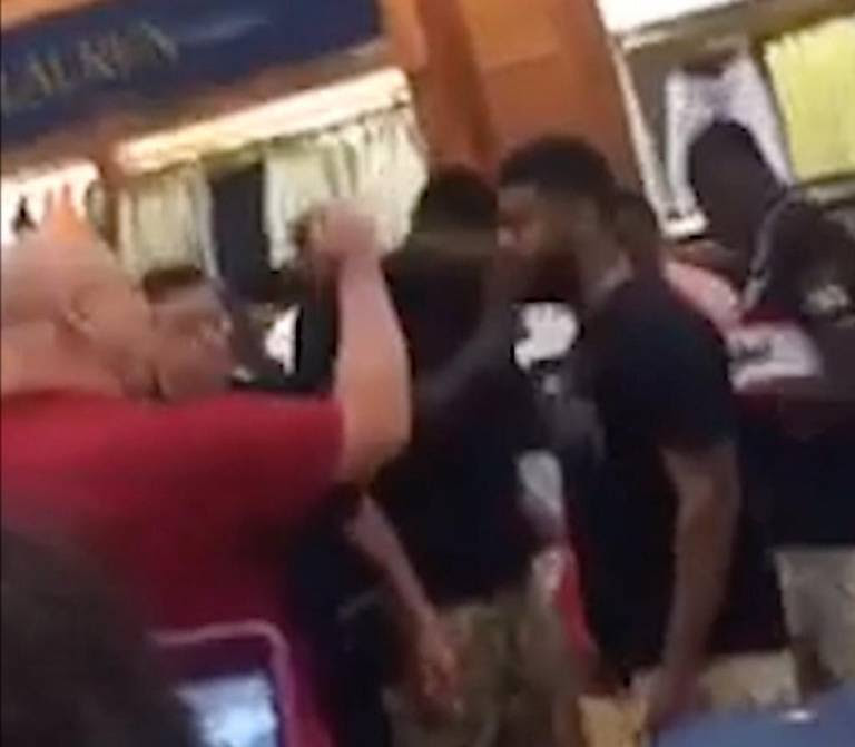 A screen shot from a video shows a loss-prevention officer for Dillard’s department store as he pepper sprays Lil Boosie on April 9, 2017, at Edgewater Mall in Biloxi.