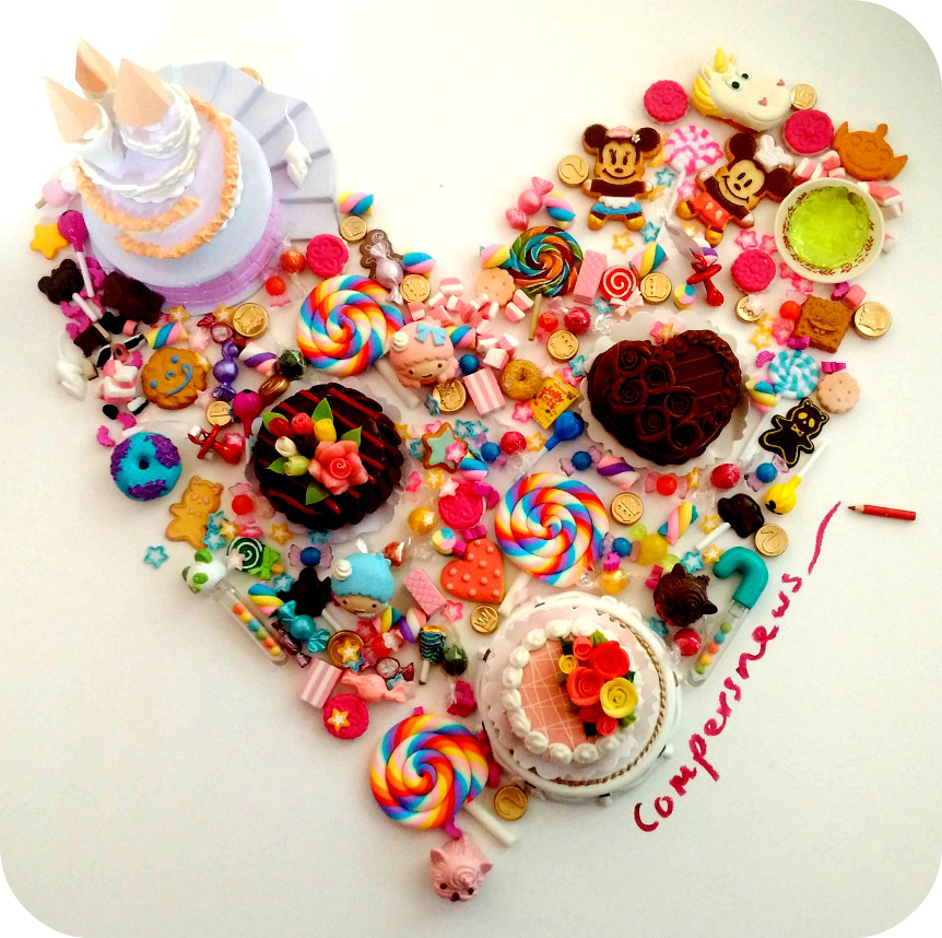 Heart made of miniature sweets and cakes