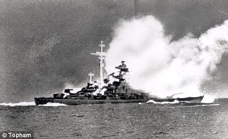Ablaze and with vast plumes of smoke rising from it, the Bismarck takes a pounding shortly before it sank with the loss of 2,206 men