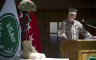 Gen. John Allen, the top U.S. commander in Afghanistan, observes Memorial Day by reading a letter written by an American soldier to his family before he died earlier this year, at the ISAF headquarters in Kabul, Afghanistan, Monday, May 28, 2012. (AP Photo/Anja Niedringhaus)