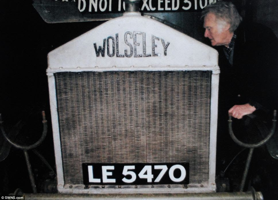 Michael Banfield with his Wolseley lorry at Iden Grange. In 1912, buyers who purchased a certain type of lorry were paid an annual subsidy of £110 to keep them in good order, the rationale being that they would be taken into Army service should war arise. This particular lorry was powered by an 8522cc bi-block four-cylinder engine. Michael Banfield bought it in the 1980s and maintained the lorry so that it is still in good working order. It sold for £23,000