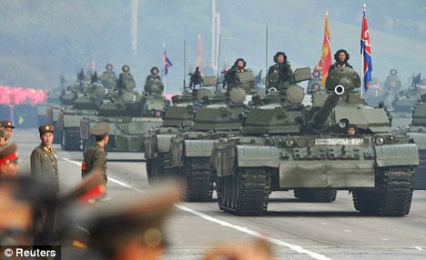 Nuclear nation: Tanks and trucks loaded with rocket launchers and grenades rolled past the assembled dignitaries