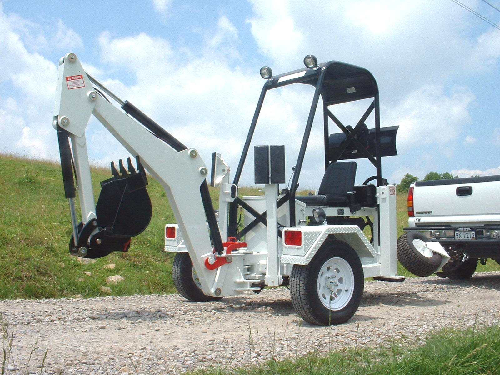Compact tractor attachments Towable backhoe
