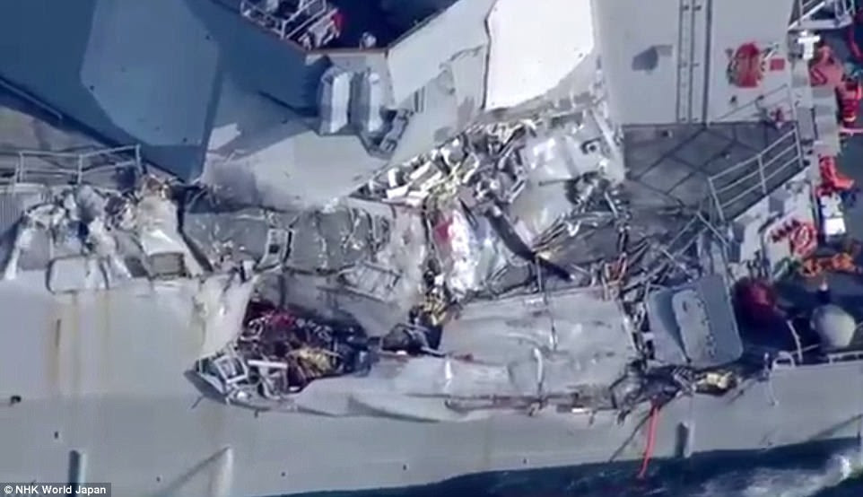 The USS Fitzgerald, a Navy destroyer, collided with a merchant vessel around 2.30am local time off the Japanese coast, suffering damage to starboard side above and below the waterline (pictured)