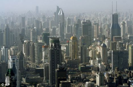China, with massively populated cities such as Shanghai, remains the world's most populous country at 1.34 billion