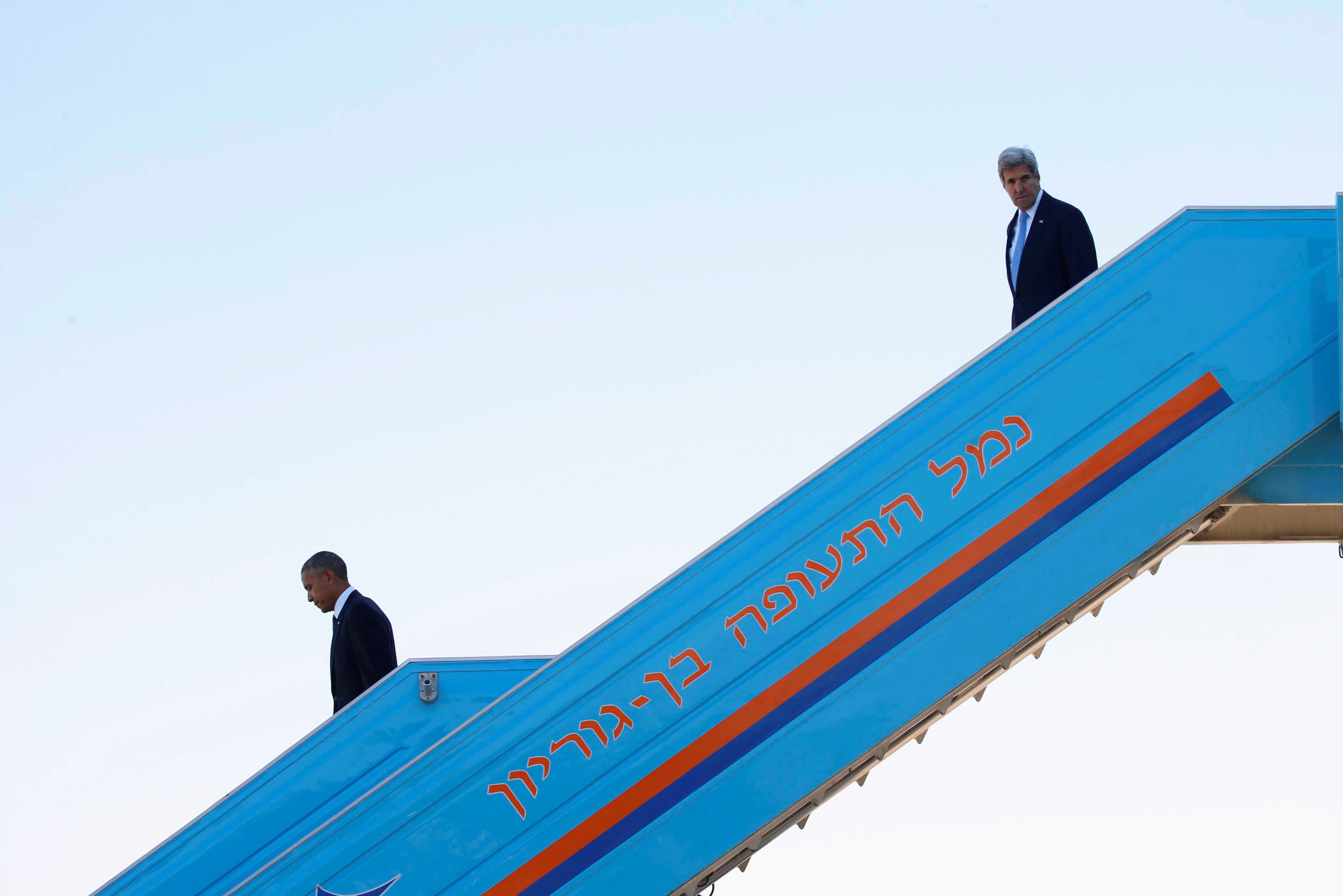 U.S President Barack Obama (L) and U.S. Secretary of State John Kerry disembark Air Force One upon landing at Israel's Ben Gurion International airport to attend the funeral of former Israeli President Shimon Peres, in Lod, Israel September 30, 2016.