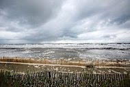 The weather begins to turn and beach fences are put in place in Grand Isle on October 4, 2013 in a mandatory evacuation ahead of Tropical Storm Karen The weather begins to turn and beach fences are put in place in Grand Isle on October 4, 2013 in a mandatory evacuation ahead of Tropical Storm Karen