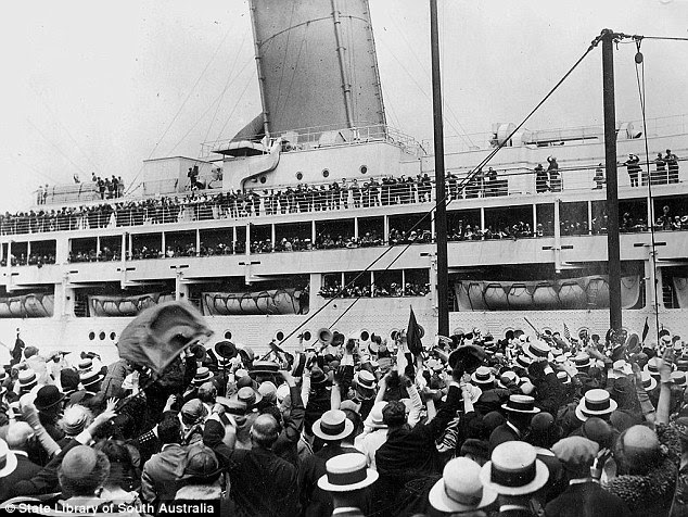 Hundreds are pictured here in chaotic scenes at the Outer Harbour as a passenger ship arrives in 1923