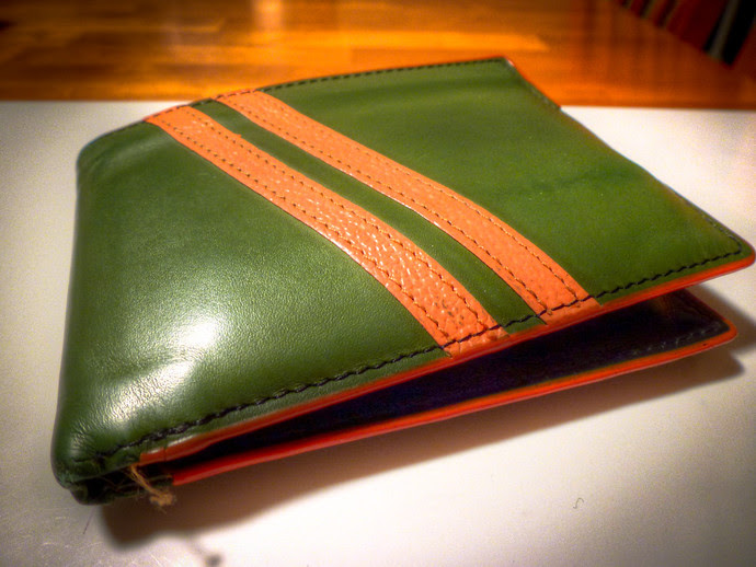 green and orange jfold wallet