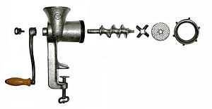 Disassembled hand-powered grinder
