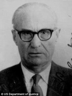War criminal: The CIA knew of Aleksandras Lileikis' possibly involvement with the mass murder of 60,000 Jews in Vilna, Lithuania, but they hired him anyway to become a spy in East Germany in 1952. Four years later they helped him move to the U.S. (his immigration picture above)