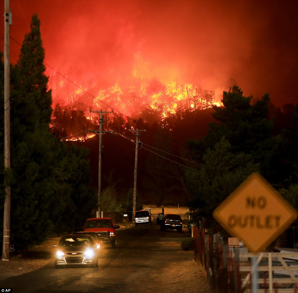 There were post-apocalyptic scenes in California Sunday night as raging wildfires blitzed 115,000 acres, destroying at least 400 homes and forcing thousands of terrified residents to flee