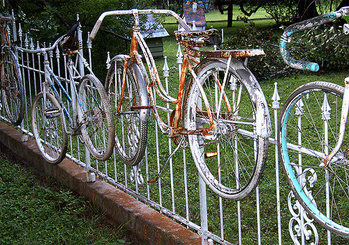 unconsumption:

It can be said that we Texans definitely like to find creative new uses for old bikes.
So far, I’ve come across four fences — that’s four in the state of Texas alone — made from bicycles.
1. A bicycle-embellished fence in the town of Salado, located between Austin and Waco, is a destination for visitors. Of course, there are other things to see in Salado, such as this old garage, but we’ll save that for another day.
Here’s another shot of the Salado fence, taken by Cara of the SchmittHouse blog: 

2. In Dallas, there’s this fence made from repurposed frames:

3. In Golden:

4. In Rockport:

(Photo credits: 1. Salado: top, bummrr01 on Flickr; bottom, SchmittHouse blog. 2. Dallas: Pedallas. 3. Golden: The Painted House blog. 4. Rockport: JayPhagan on Flickr.)
Are there others? If so, let us know!
