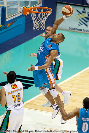 Yep - it went in - Ira Clark with the massive jam - Gold Coast Blaze v Townsville Crocodiles NBL Basketball, Friday 17 December 2010 - National Basketball League, Gold Coast Convention & Exhibition Centre, Queensland, Australia. Photos by Des Thureson. Yep - it went in - Ira Clark with the massive jam - Gold Coast Blaze v Townsville Crocodiles NBL Basketball, Friday 17 December 2010 - National Basketball League, Gold Coast Convention & Exhibition Centre, Queensland, Australia. Photos by Des Thureson.