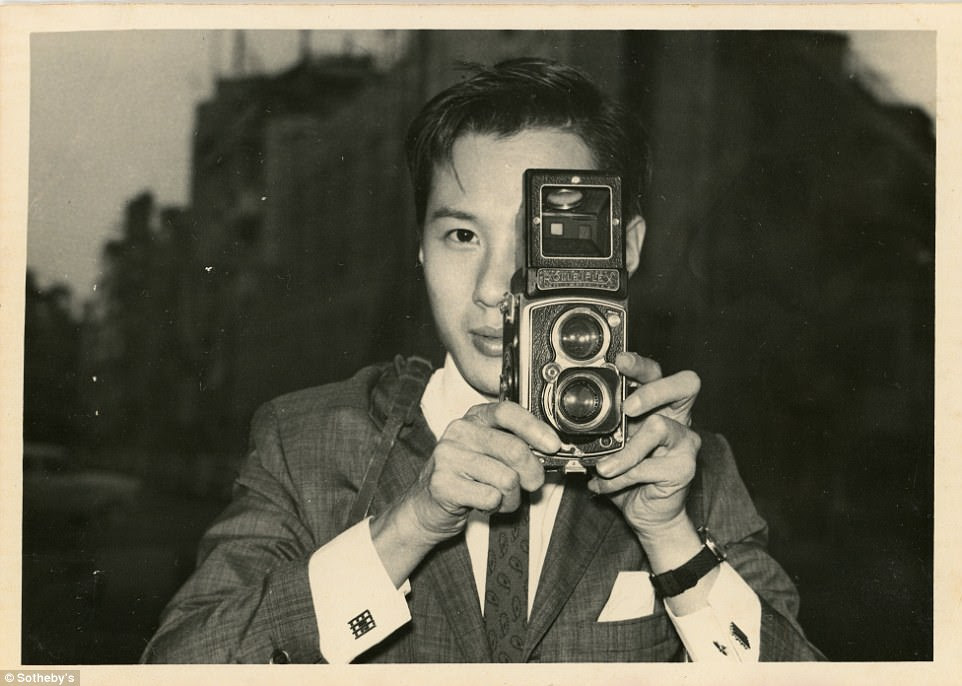 Mr Ho took a self portrait  with his  camera. He was wildly regarded as the most famous photographer from Hong Kong