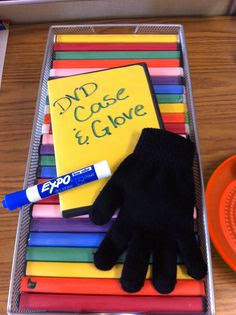 How Cool is this!!  Use dvd cases with solid paper for mini "white" boards...everybody gets a glove/sock for an eraser to store inside the case. Smart idea!