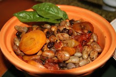cooked beans in orange bowl