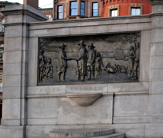A plaque depicting the founding of Boston in 1630 located in Boston Common.