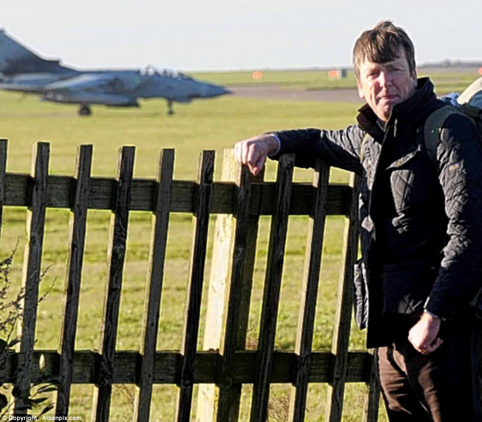 Tornado strike jets (pictured) are protected by a flimsy 5ft-high picket fence at an RAF base
